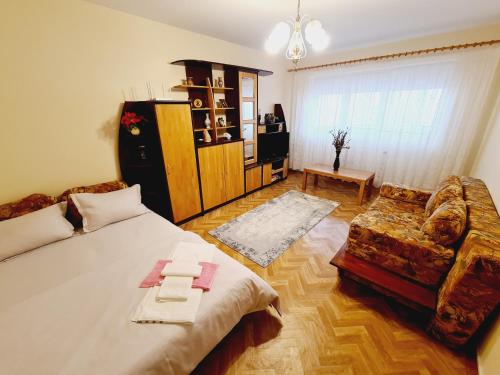 Krevet ili kreveti u jedinici u objektu Apartament Slănic Prahova