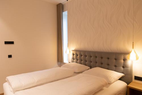 Cama ou camas em um quarto em Luxury Apartment Villa Ortler