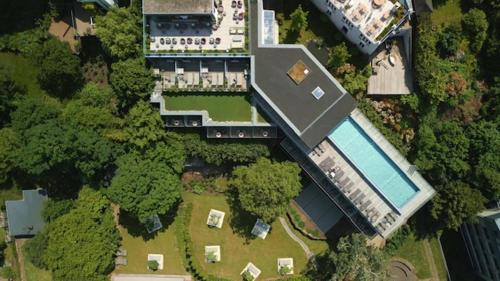 an aerial view of a house with a swimming pool at Hotel Villa Hügel in Trier