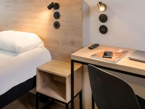 Ліжко або ліжка в номері ibis Styles Namur