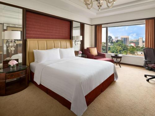 Voodi või voodid majutusasutuse Shangri-La Kuala Lumpur toas