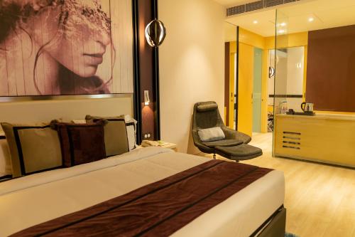 BEYZAA HOTEL AND SUITES में एक कमरे में एक या कई बेड