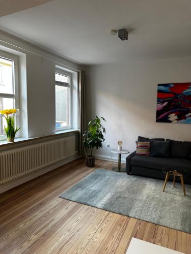 Oleskelutila majoituspaikassa Großzügige 3-Zimmer Altbauwohnung