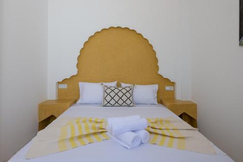 A bed or beds in a room at Riad SULTANA