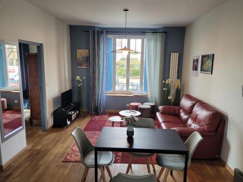 Et sittehjørne på Appartements CDG JOIGNY