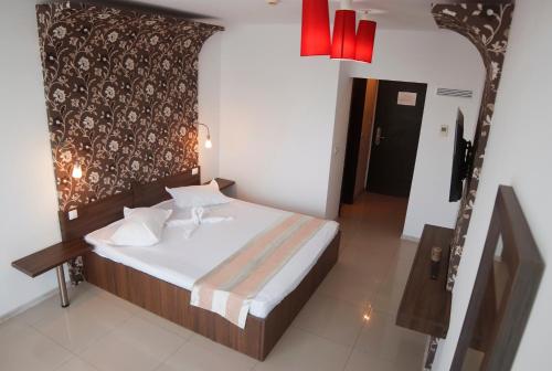 Cama ou camas em um quarto em Hotel 2D Resort and Spa