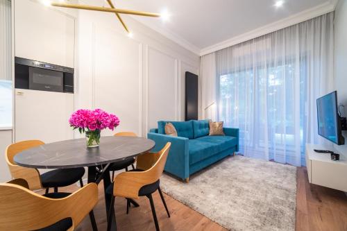 Lake Park Apartament tesisinde bir televizyon ve/veya eğlence merkezi