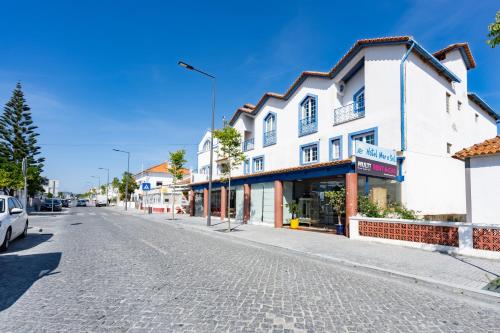 El barrio en el que está el hotel o un barrio cercano