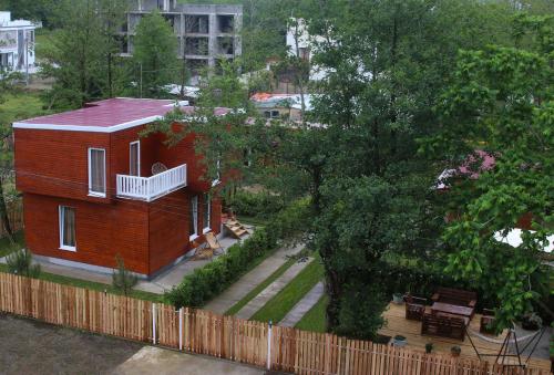 גינה חיצונית ב-Cottages in Kaprovani "Family nest"