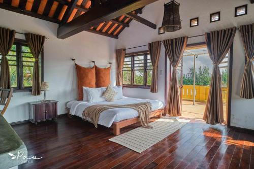 Giường trong phòng chung tại Pao Homes - An Hai Villa, Family-Friendly Villa with Pool