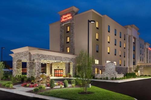 a rendering of the inn at night at Hampton Inn & Suites Williamsport - Faxon Exit in Williamsport