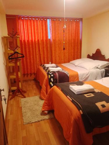 hostal ollantaytambo apartments 객실 침대