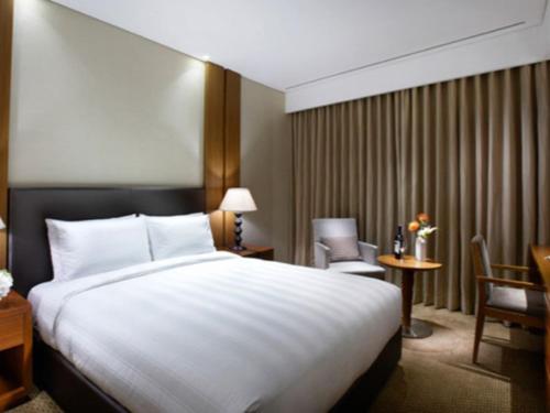 Cama ou camas em um quarto em LOTTE City Hotel Guro