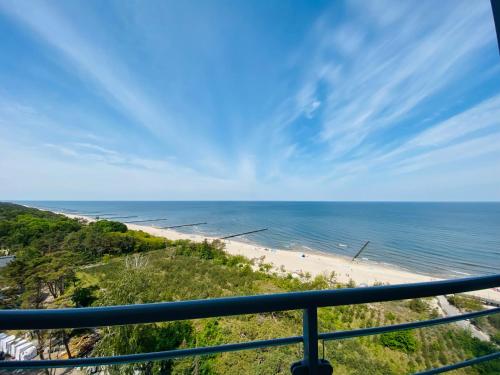 - Balcón con vistas a la playa en Sea Breeze Apartment, en Dziwnówek