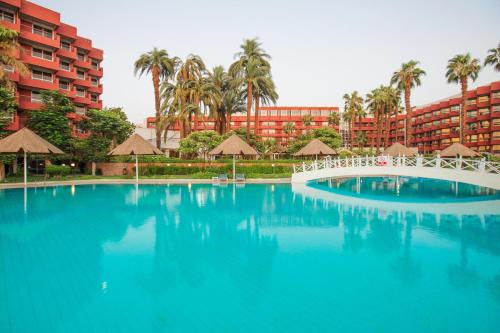 The swimming pool at or close to Pyramisa Hotel Luxor