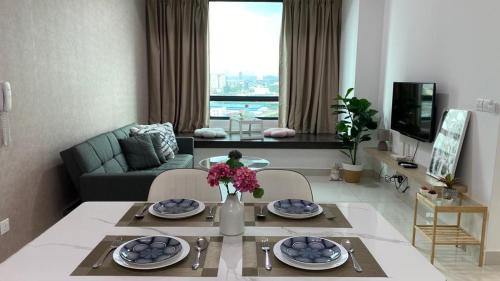 Un lugar para sentarse en NEW Sunway Greenfield Home 2-6pax 5mins to Sunway Pyramid