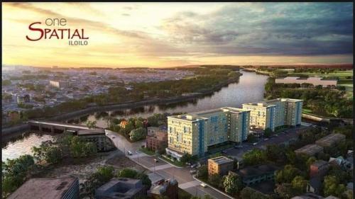 d'une ville avec une rivière et des bâtiments dans l'établissement One spatial condominium by filinvest, à Iloilo