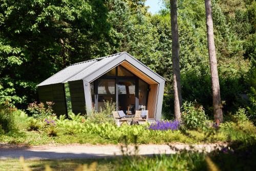 オーイステルウェイクにあるKampinaStaete Diamond Suiteの小屋