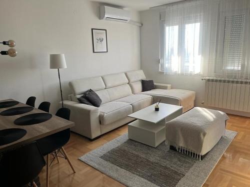 Prostor za sedenje u objektu Loft Luxury Apartment