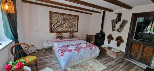 A bed or beds in a room at CasaGeo Cheile Nerei