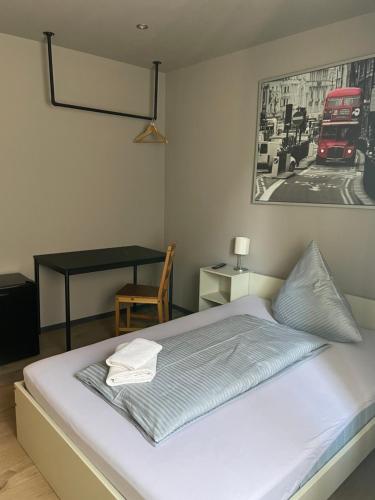 Vuode tai vuoteita majoituspaikassa Alpha Fremdenzimmer