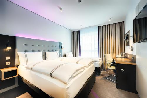 Gulta vai gultas numurā naktsmītnē Premier Inn Darmstadt City Centre