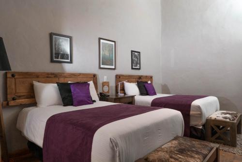 Vuode tai vuoteita majoituspaikassa Casa Brunella - Hotel Boutique Querétaro