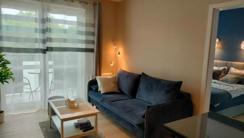 Ένα ή περισσότερα κρεβάτια σε δωμάτιο στο Apartament Azul