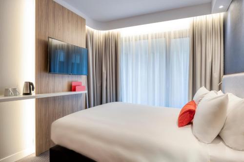 Katil atau katil-katil dalam bilik di Holiday Inn Express Antwerp - City Centre, an IHG Hotel