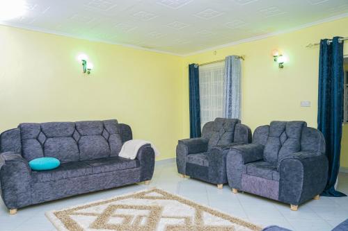 Uma área de estar em Entire Fully furnished Villas in Kisii