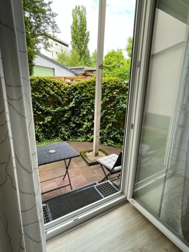 a view of a patio from a sliding glass door at Stadtapartment WOHNEN48.AT in Klagenfurt