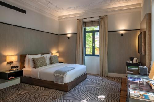 เตียงในห้องที่ Casa da Marechal - Boutique Hotel by Oporto Collection - Adults Only