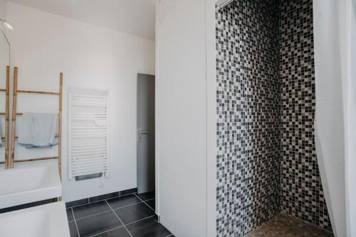 Un baño de Coeur de ville #H2- Central & Cosy - Logement partagé - Chambre privée