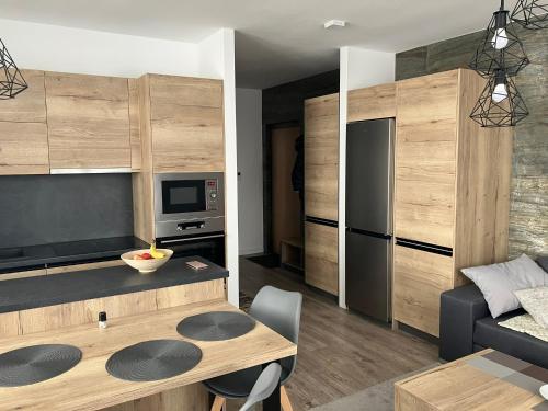 Dapur atau dapur kecil di Apartmány Vila Vlasta Vysoké Tatry