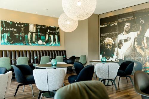 Зона вітальні в Motel One München-Garching