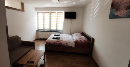 Ліжко або ліжка в номері Apartmán Kristýna