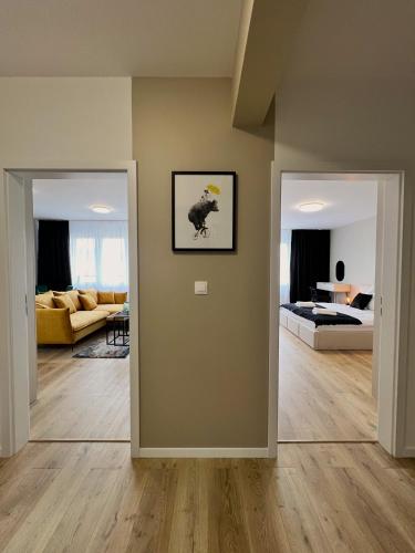 Posteľ alebo postele v izbe v ubytovaní Cozy Stay Apartment