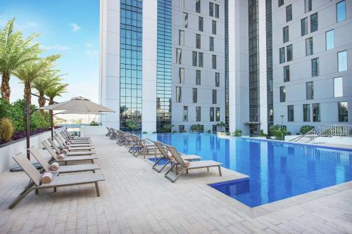 The swimming pool at or close to Hampton By Hilton Dubai Airport