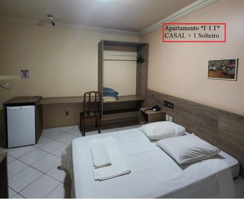 Ein Bett oder Betten in einem Zimmer der Unterkunft HOTEL CAMPO GRANDE