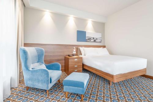 เตียงในห้องที่ Hampton by Hilton Oswiecim