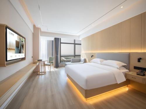 Deep Sleep Hotel Hangzhou Dajiang East Haide Xingang Center 객실 침대