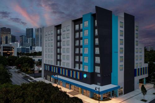 an architectural rendering of a building with a city at Tru By Hilton Miami West Brickell in Miami