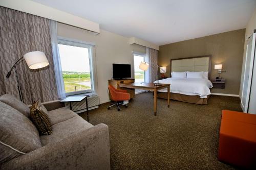 Krevet ili kreveti u jedinici u okviru objekta Hampton Inn & Suites Truro, NS