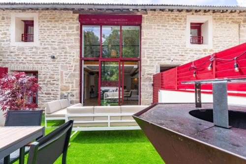 Posezení v ubytování Charmante Maison Climatisée avec son Jardin à 10 minutes de DIJON