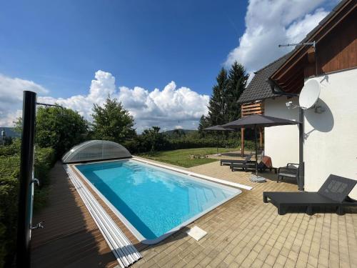 The swimming pool at or close to Villa Gamma - Lipno Home