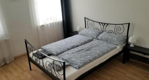 Ліжко або ліжка в номері 1-Zimmer Apartment in der Nähe vom Petersberg