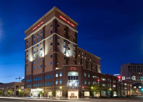 a building with a sign on the top of it at Hampton Inn & Suites Boise-Downtown in Boise