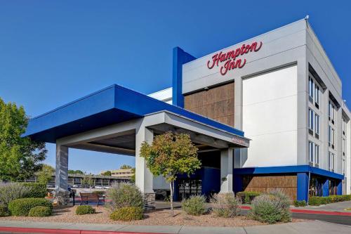 a store front of a shopping center at Hampton Inn Albuquerque - University/Midtown in Albuquerque