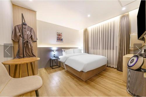 Llit o llits en una habitació de Brown Dot Hotel Yeonsan