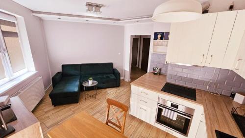 Кухня або міні-кухня у Apartament Młynarska